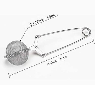 Metallic tea ball with dimensions labeled on a white background